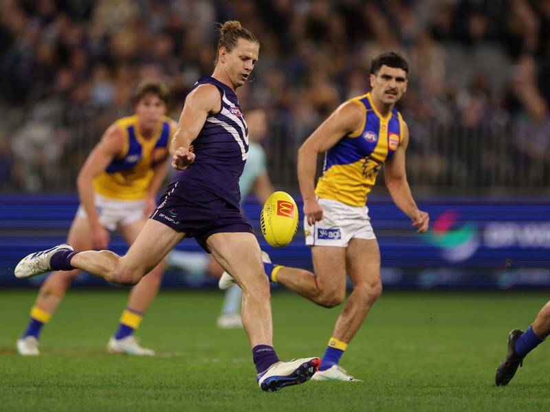 Nat Fyfe has played 19 games this season but looks set to miss Sunday's game against the Bombers. Photo: Richard Wainwright/AAP PHOTOS