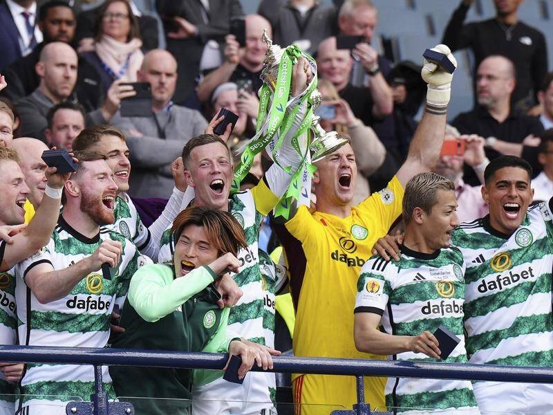 Celtic celebrate another double after beating Rangers in the Scottish Cup final at Hampden. (AP PHOTO)