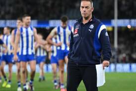 Kangaroos coach Alastair Clarkson has leapt to the defence of under-pressure AFL umpires. (Joel Carrett/AAP PHOTOS)