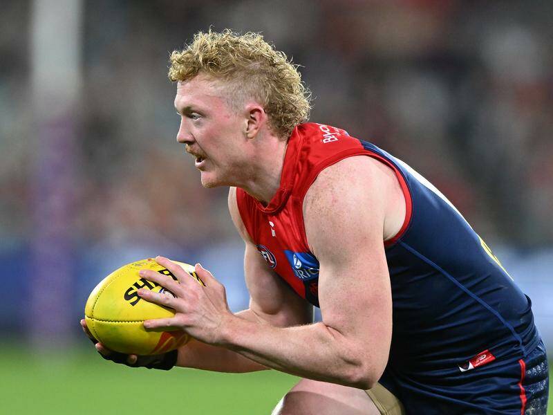 Star midfielder Clayton Oliver's future lies with Melbourne, according to coach Simon Goodwin. Photo: James Ross/AAP PHOTOS
