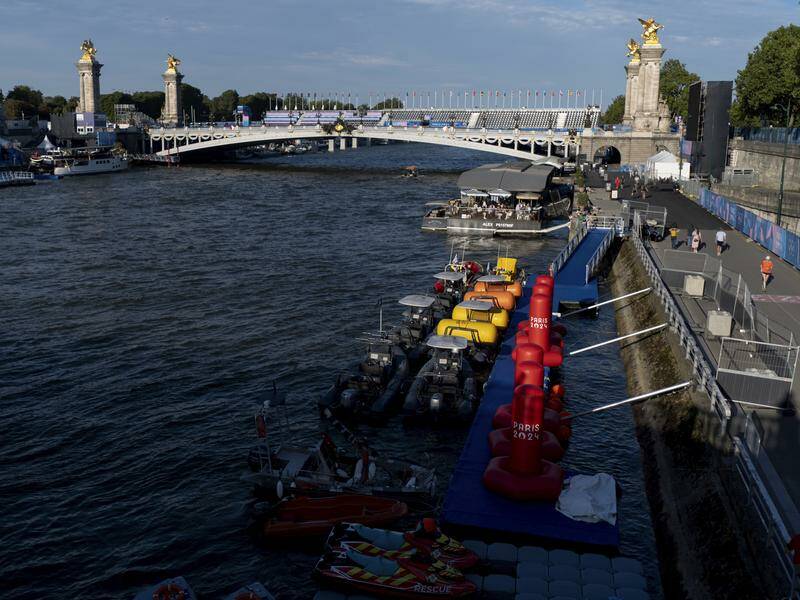 Triathletes have again been unable to swim in the Seine river due to the low level of water quality. Photo: AP PHOTO