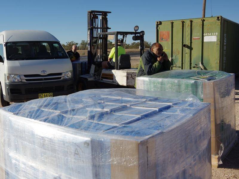 Pallets of packaged water are delivered for distribution to Walgett and surrounding villages. (PR HANDOUT IMAGE PHOTO)