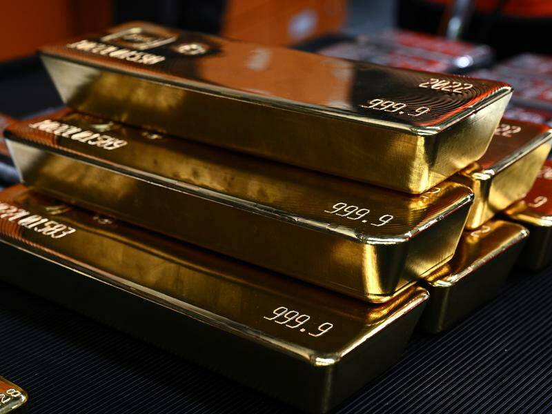 Gold hit a new record in trading in Asia after lower yields propelled the precious metal higher. Photo: Dan Himbrechts/AAP PHOTOS
