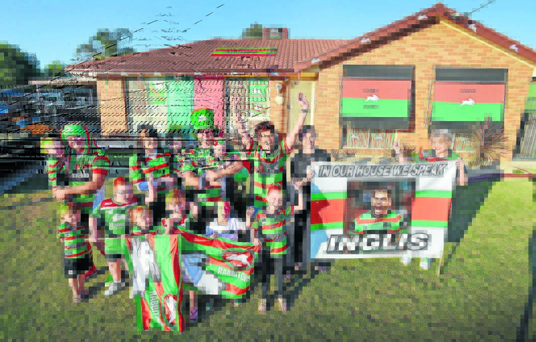 GLORY, GLORY: The Booby clan show their passion for Souths ahead of tomorrow night s grand final. In true colours are, front, from left, Jaicee Booby, Zac Bingham, Mia and Kaileigh Booby, Kobhan Nean and Siennah Booby. At the back, Kaidah and Josh Booby, Samara Bingham and baby Grace Booby, Scott, Kheely, Jodie, Chelsea and Terrie Booby. 031014BSD02
