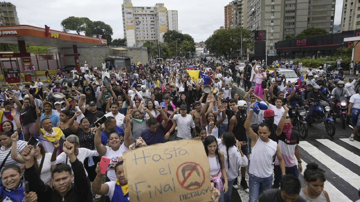 Thousands of demonstrators rallied across Venezuela against the official election results. (AP PHOTO)