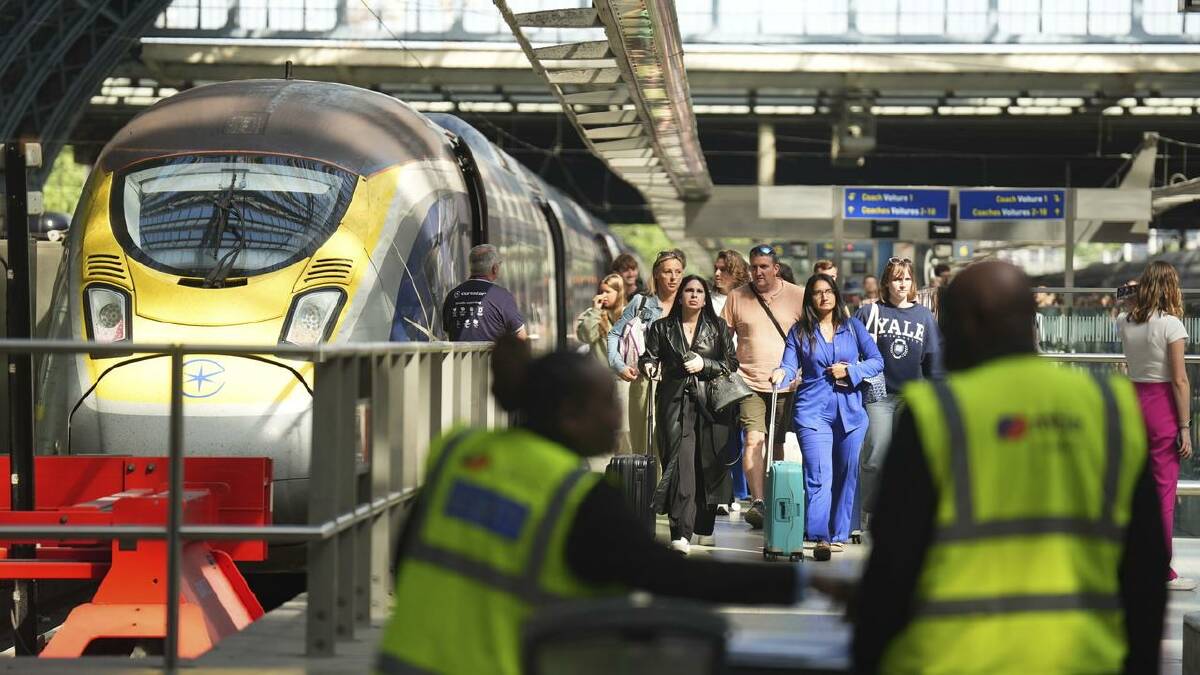 Passengers at St Pancras station in London were warned to expect delays on the Eurostar. (AP PHOTO)