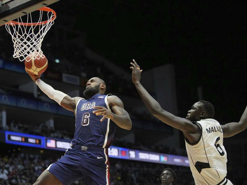 LeBron James has spared US blushes with a late basket to see off South Sudan in a pre-Olympics game. Photo: AP PHOTO