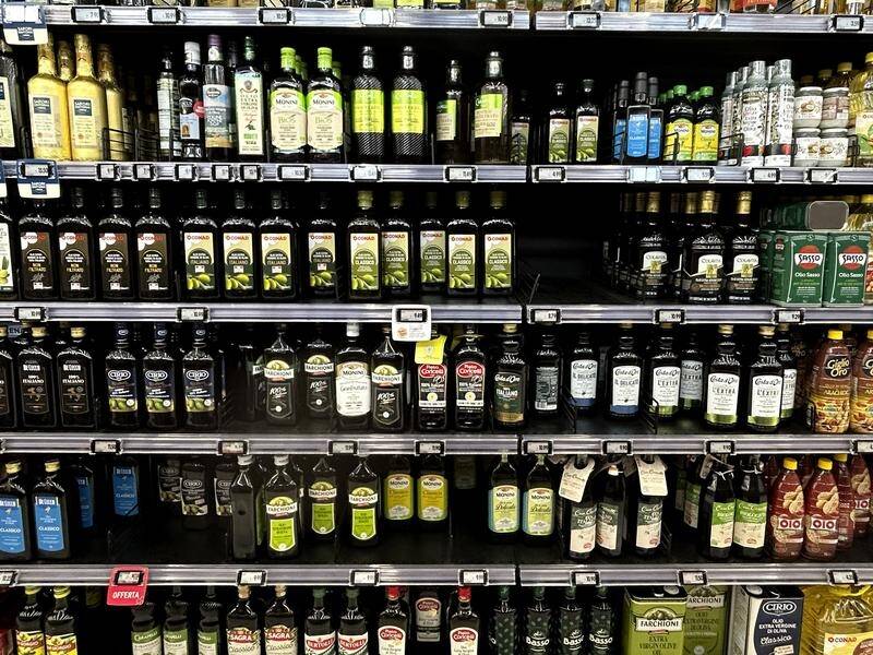 Italians are reducing their consumption of extra virgin olive oil due to skyrocketing prices. (AP PHOTO)