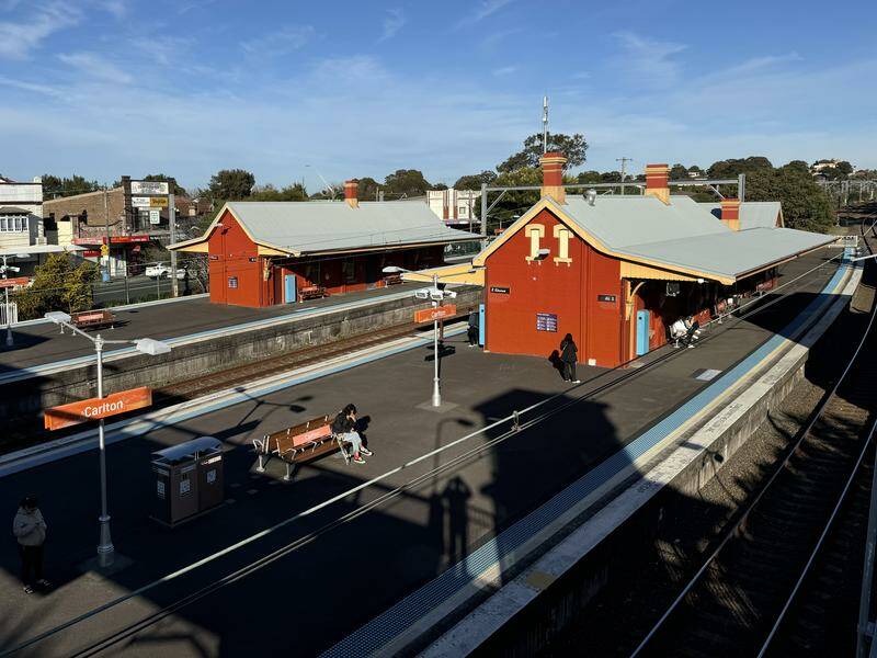 A pram carrying twin girls rolled from a platform onto tracks, killing a toddler and her dad. Photo: Mick Tsikas/AAP PHOTOS