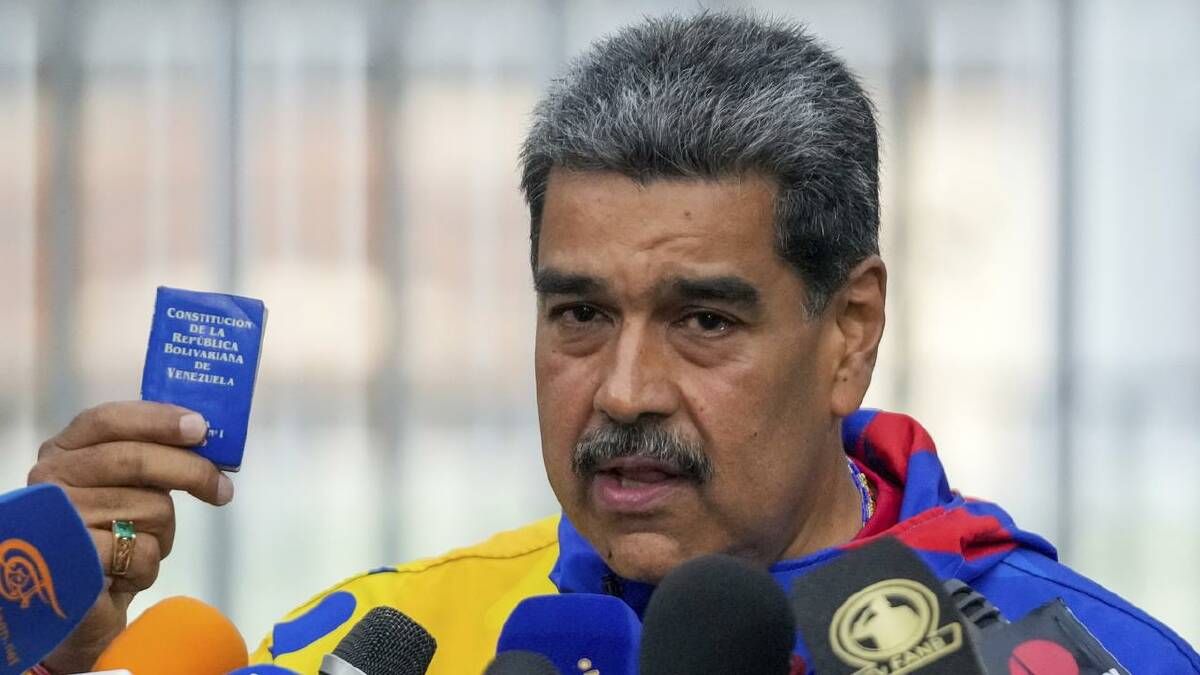 President Nicolas Maduro has promised to recognise the election result.  (AP PHOTO)