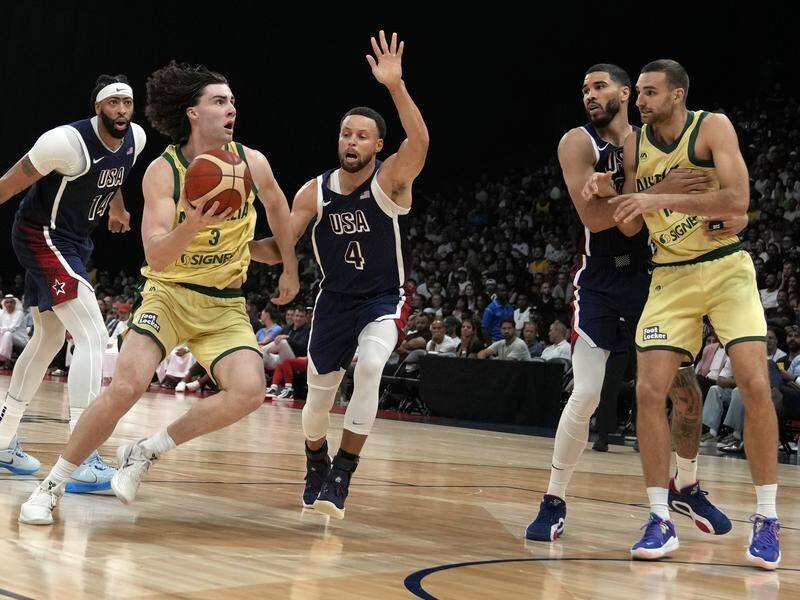 Josh Giddey (3) has impressed as the Boomers pushed the United States in a pre-Games loss. (AP PHOTO)