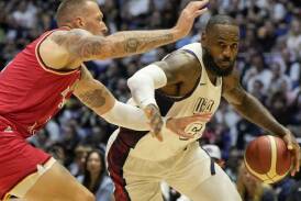 LeBron James took charge late to ensure the US overcame Germany in their final pre-Games hitout. Photo: AP PHOTO
