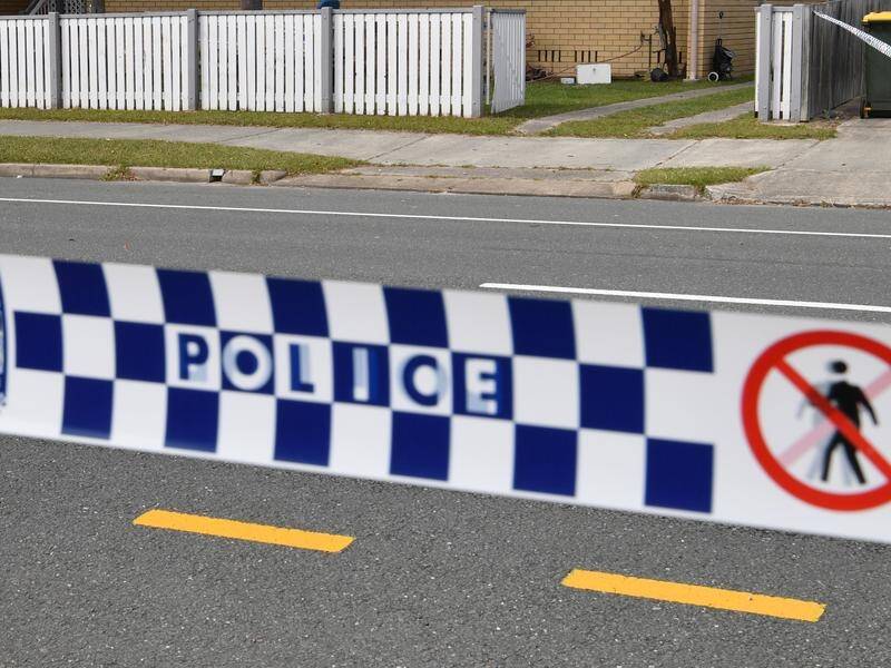 The bodies of a man and woman, both in their 30s, have been found in a home south of Brisbane. (Darren England/AAP PHOTOS)