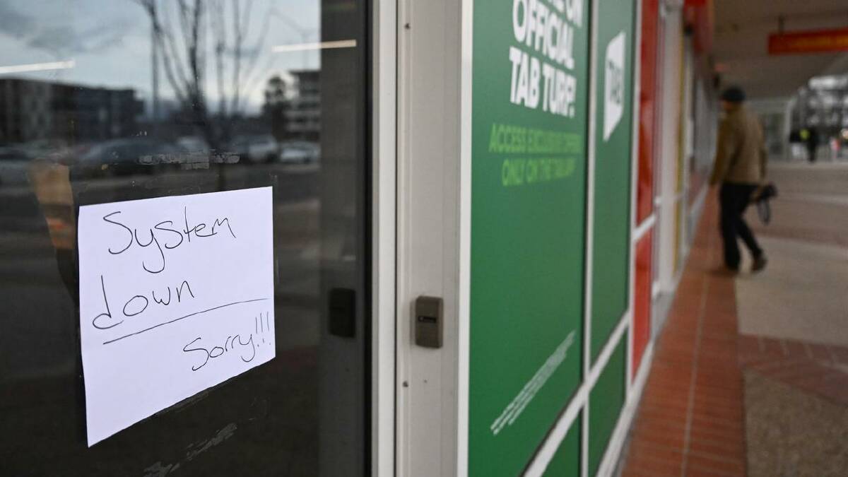 Many businesses around the country were forced to close their doors after being hit by the outage. (Lukas Coch/AAP PHOTOS)