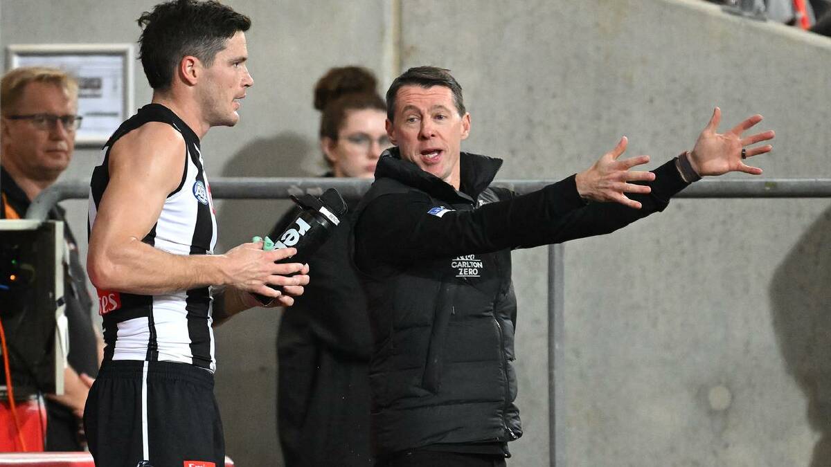 Craig McRae has several headaches to manage in trying to guide Collingwood's troubled title defence. (Dave Hunt/AAP PHOTOS)