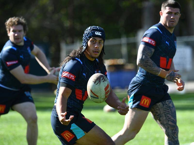 Jarome Luai (centre) has been tipped for big things at the Wests Tigers next year. (Jono Searle/AAP PHOTOS)