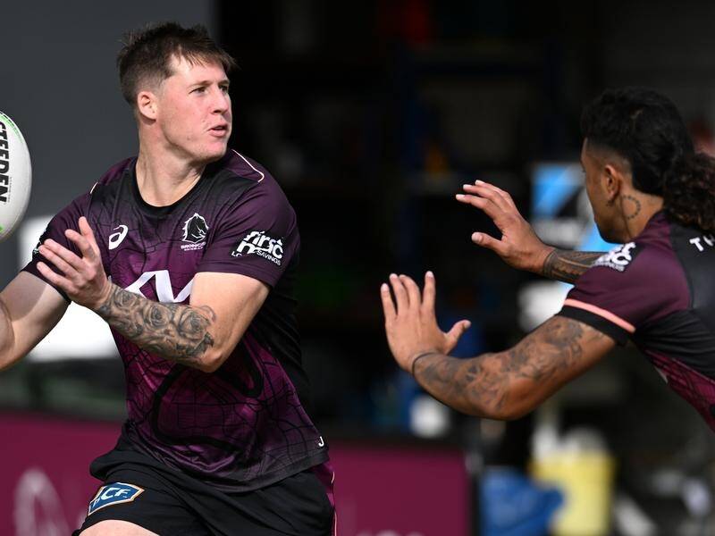 Josh Rogers (l) has the chance to show he can follow Adam Reynolds as Broncos halfback. (Darren England/AAP PHOTOS)