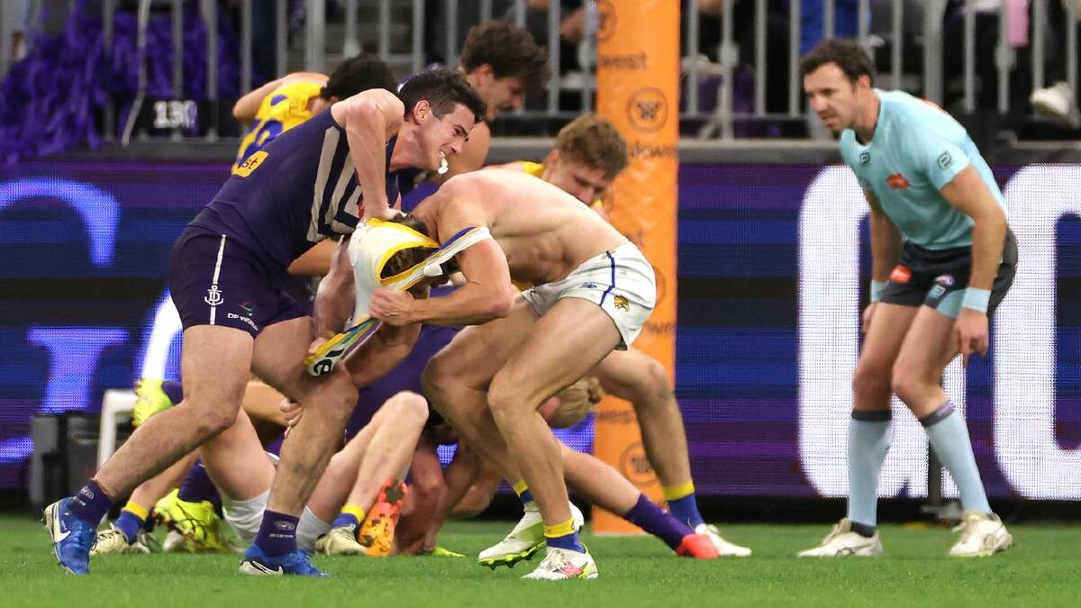 Dockers and Eagles players indulge in another melee during their bad-tempered match in Perth.  (Richard Wainwright/AAP PHOTOS)
