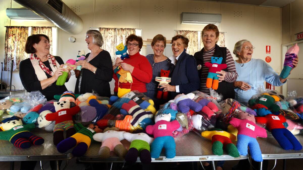 Tamworth Red Cross women made trauma bears at Red Cross House in May. Photo:Barry Smith 290513BSA01