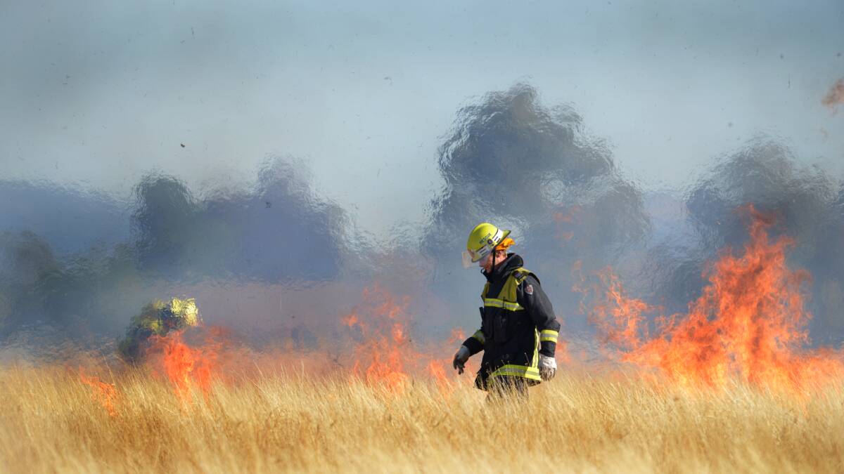 Firefighters attend a blaze at the old brickworks in Tamworth. Photo:Barry Smith 040513BSH09