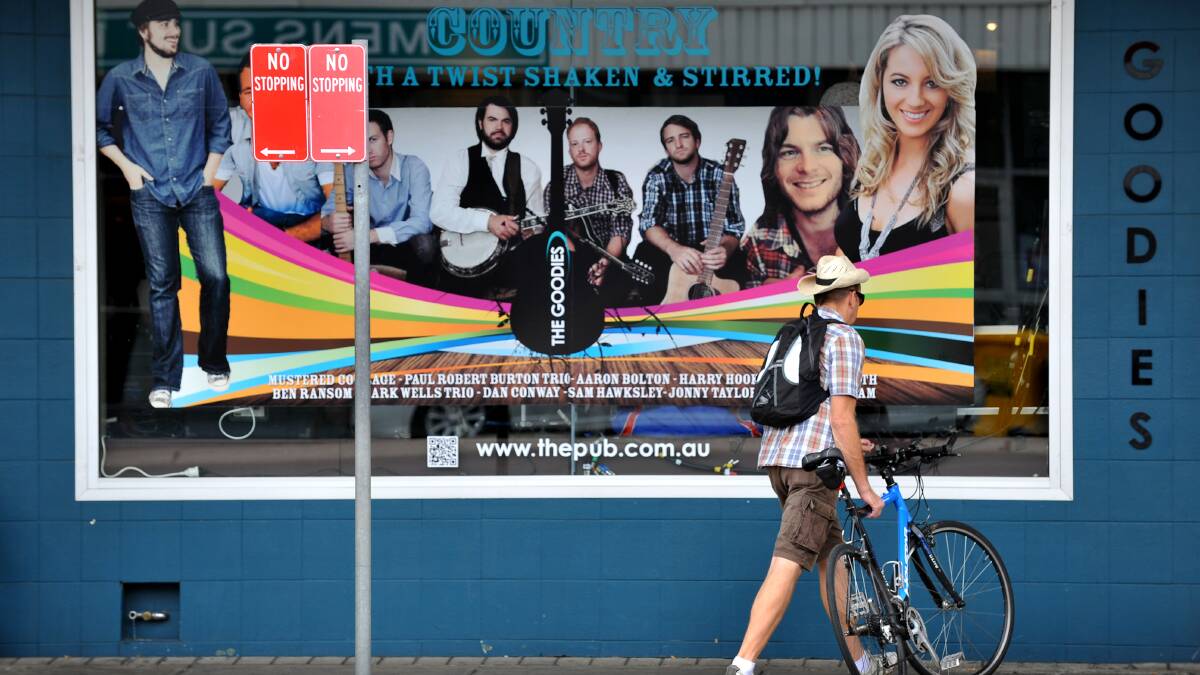 Bright colours outside a Tamworth venue during the Tamworth Country Music Festival. Photo:Barry Smith 220113BSH02