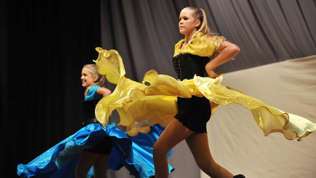 Caitlin O'Neill and Jessie Kernaghan perform as part of the Lennox Beach team at the 21st Annual Australian Line Dance Championships in January. Photo:Barry Smith 220113BSB40