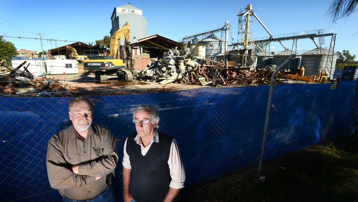 David Saunders and Bill Bryan standing at the site of the old  Weston Animal Nutrition plant in September. Photo:Barry Smith 230913BSD08