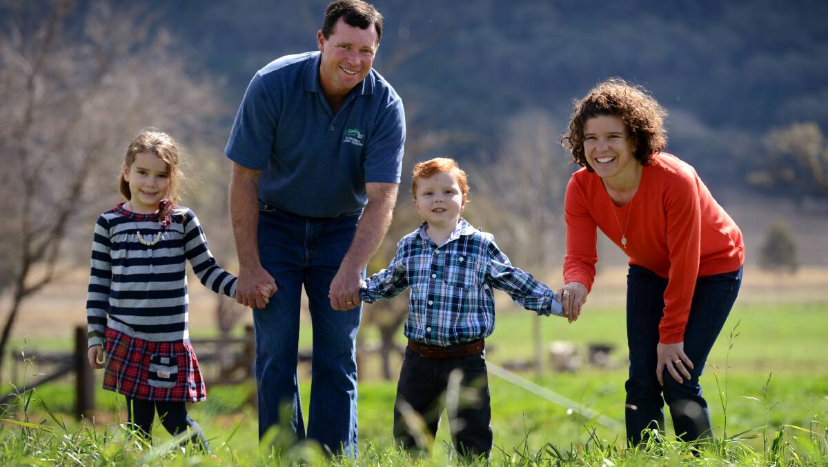 Richard, Patrick, Emma and Olivia Coombes at their Manilla dairy farm in August. Photo:Barry Smith 240813BSA11