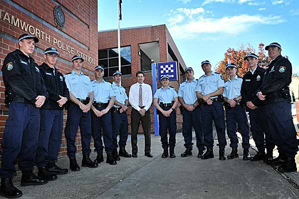 NEW ON THE BLOCK: From left, probationary constables Adam Taylor, Paul Wadell, Nickolas Kelly, Michael Marriott, Christopher Wade, Maria Nolan, Brett Ramage, Daniel McMullan, Ben Stanley, Rhys Mort and Michael Rainbow, with member for Tamworth Kevin Anderson, centre. Photo: Geoff O’Neill 070512GOD03
