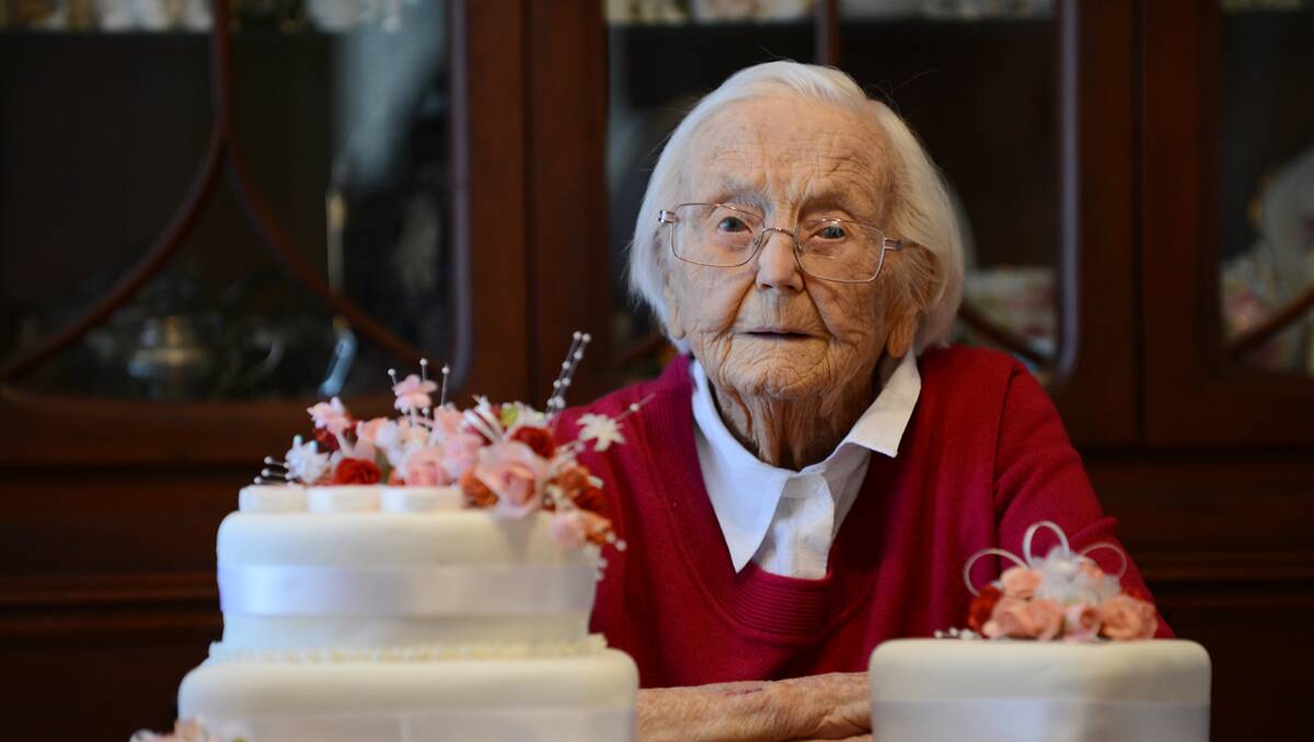 HAPPY BIRTHDAY: Sybil Palmer with her 100th birthday cake.  Photo: Barry Smith 280813BSB14